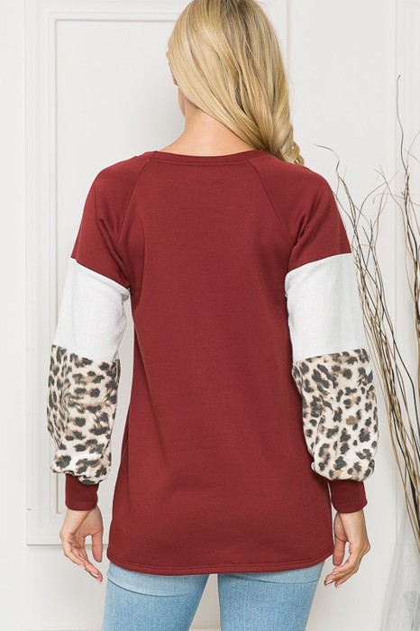 SOLID TUNIC TOP WITH ANIMAL COLOR BLOCK SLEEVES