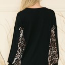 Small BLACK SOLID TUNIC TOP WITH ANIMAL SIDE CONTRAST