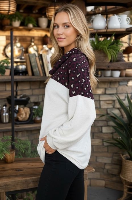 SOLID TUNIC TOP WITH ANIMAL CONTRAST PUFF SLEEVES