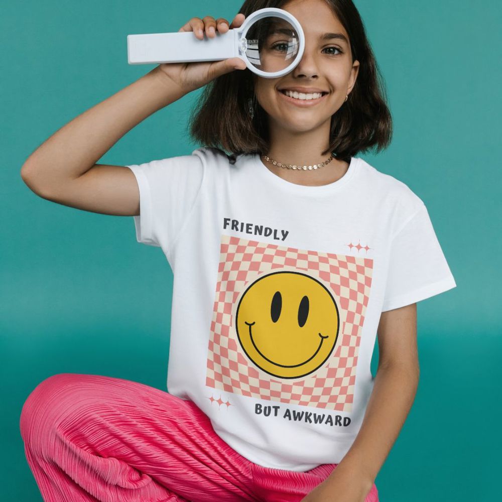 Friendly But Awkward Shirt; Smiley Face Graphic T-shirt; Funny and Friendly Tee; Tween Girl Popular graphic T-shirt; Teen Girl Apparel Gift