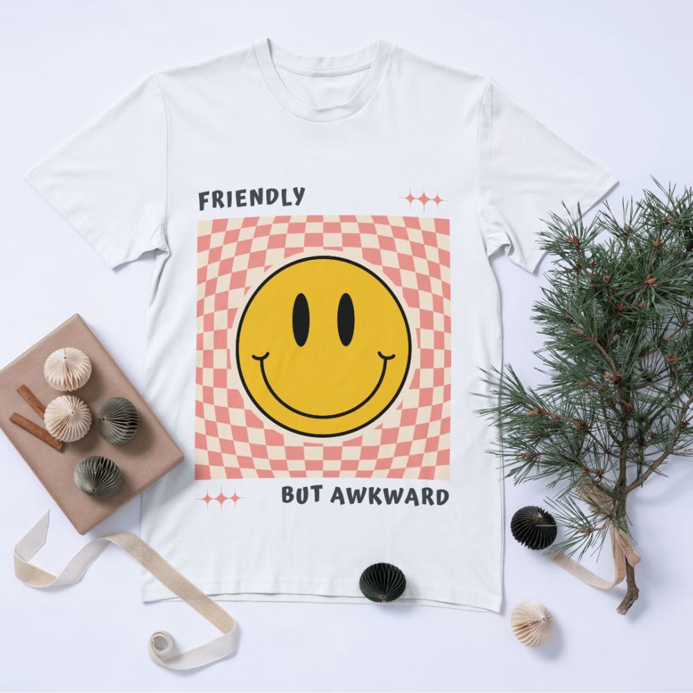 Friendly But Awkward Shirt; Smiley Face Graphic T-shirt; Funny and Friendly Tee; Tween Girl Popular graphic T-shirt; Teen Girl Apparel Gift