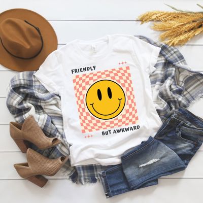 Friendly But Awkward Shirt; Smiley Face Graphic T-shirt; Funny and Friendly Tee; Tween Girl Popular graphic T-shirt; Teen Girl Apparel Gift