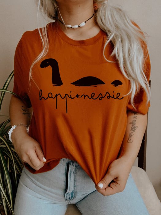 Happinessie Happy Loch Ness Monster Nessie | Soft Unisex T-shirt for Women Soft Cozy Longer Length Unisex Graphic Tee T-shirt