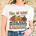  Fall In Love With Learning Cute Back To School Vintage Retro Characters - Softer Longer Length Bella Canvas Tee
