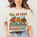  Fall In Love With Learning Cute Back To School Vintage Retro Characters - Softer Longer Length Bella Canvas Tee