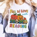  Fall In Love With Reading Vintage Retro Fall Halloween School Teacher - Soft Longer Length Bella Canvas Tee