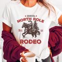  Annual North Pole Rodeo Santa Claus Christmas Time - Soft Longer Length Bella Canvas Tee