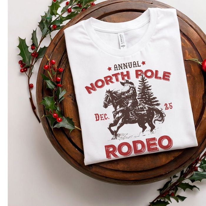 Annual North Pole Rodeo Santa Claus Christmas Time - Soft Longer Length Bella Canvas Tee