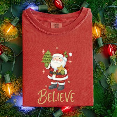 Believe 1990s Toll Paint Style Santa Claus With Tree and Star - T-Shirt (Crewneck)  100 Cotton Heavyweight Tee (Unisex)  Comfort Colors