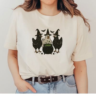 Three Chickens Around A Cauldron Cute Halloween Hens - Super Soft and Cozy Longer Length Bella Canvas T-Shirt