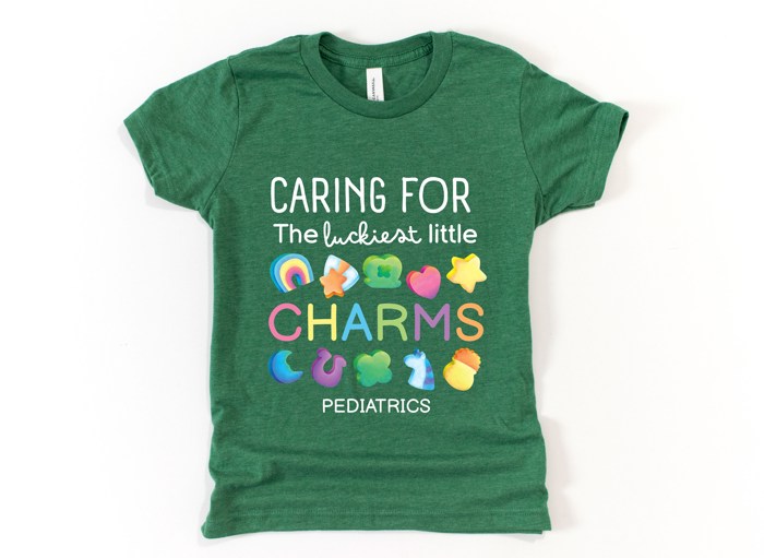 Caring for the Luckiest Little Charms St. Patrick's Day Pediatrics Peds Nurse Soft Cozy Longer Length Unisex Graphic Tee T-shirt