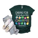  Caring for the Luckiest Little Charms St. Patrick's Day Pediatrics Peds Nurse Soft Cozy Longer Length Unisex Graphic Tee T-shirt