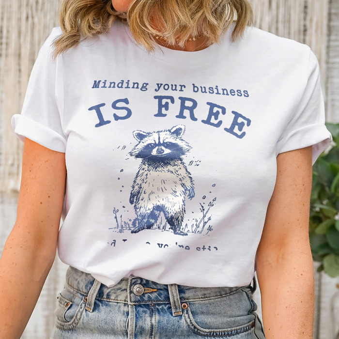 Minding your business is free and i see you're still too broke to afford that. funny Raccoon Wisdom: Mind Your Business Soft Cozy Longer Length Unisex Graphic Tee T-shirt