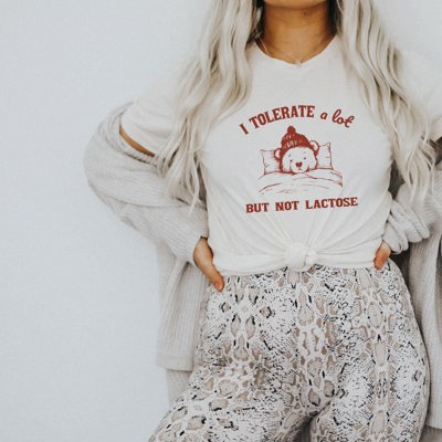 I Tolerate A Lot, But Not Lactose Intolerant Funny Cute Sarcastic Teddy Bear Soft Cozy Longer Length Unisex Graphic Tee T-shirt