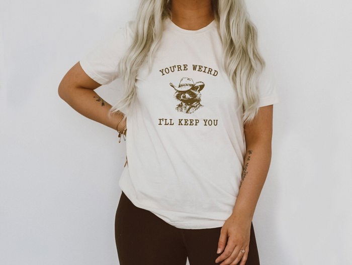 You're Weird I'll Keep You Funny Raccoon Trash Panda Funny Cute Sarcastic Soft Cozy Longer Length Unisex Graphic Tee T-shirt