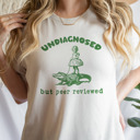  Undiagnosed but peer reviewed. Crocodile Confidence: Undiagnosed Yet Peer Reviewed! Soft Cozy Longer Length Unisex Graphic Tee T-shirt