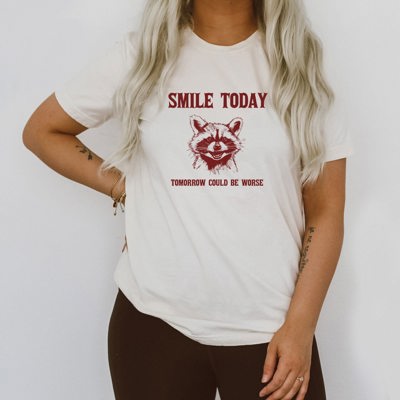 Smile Today Tomorrow Could Be Worse Funny Raccoon Trash Panda Funny Cute Sarcastic Soft Cozy Longer Length Unisex Graphic Tee T-shirt