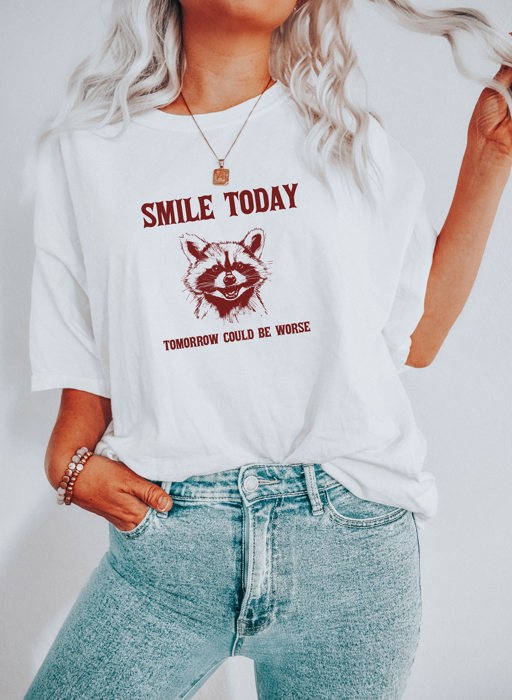 Smile Today Tomorrow Could Be Worse Funny Raccoon Trash Panda Funny Cute Sarcastic Soft Cozy Longer Length Unisex Graphic Tee T-shirt