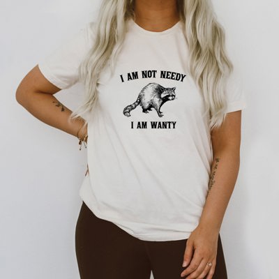 I'm Not Needy I'm Wanty Silly Raccoon Trash Panda Funny Cute Sarcastic Soft Cozy Longer Length Unisex Graphic Tee T-shirt