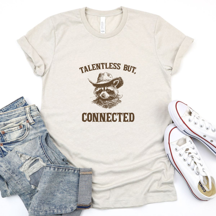 Talentless yet Connected: A Raccoon’s Charm Soft Cozy Longer Length Unisex Graphic Tee T-shirt