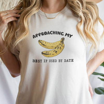 APPROACHING MY BEST IF USED BY DATE | Banana Countdown: Embrace the Ripe Journey Soft Cozy Longer Length Unisex Graphic Tee T-shirt