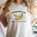  APPROACHING MY BEST IF USED BY DATE | Banana Countdown: Embrace the Ripe Journey Soft Cozy Longer Length Unisex Graphic Tee T-shirt