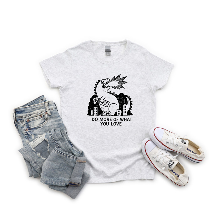 DO MORE OF WHAT YOU LOVE | Unleash Your Passion: A Roaring Reminder to Embrace Joy Soft Cozy Longer Length Unisex Graphic Tee T-shirt