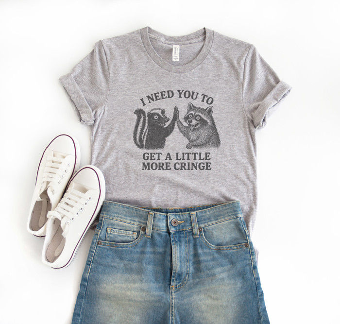 I NEED YOU TO GET A LITTLE MORE CRINGE | Embrace the Quirk: Let's Cringe Together! Soft Cozy Longer Length Unisex Graphic Tee T-shirt