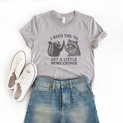 I NEED YOU TO GET A LITTLE MORE CRINGE | Embrace the Quirk: Let's Cringe Together! Soft Cozy Longer Length Unisex Graphic Tee T-shirt