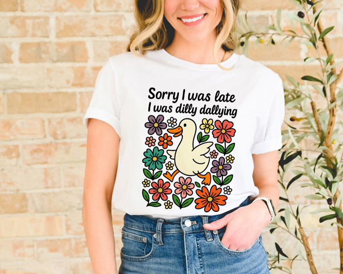 Sorry I was late I was dilly dallying | Quirky Wanderer: A Duck's Delightful Delay Soft Cozy Longer Length Unisex Graphic Tee T-shirt