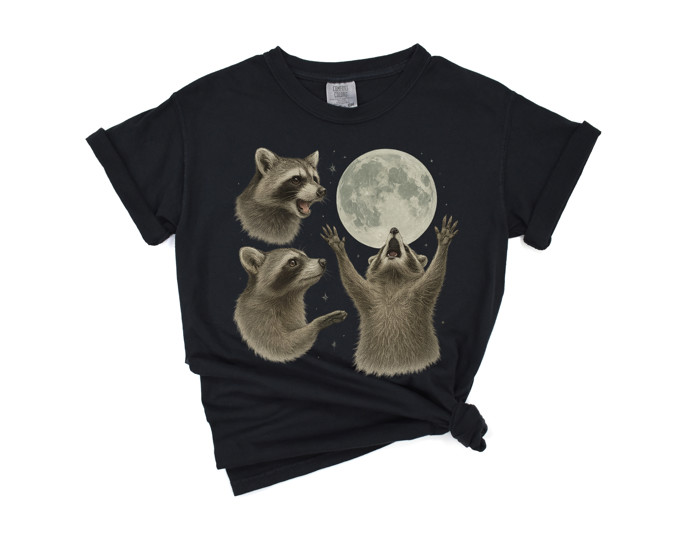 Raccoon Moonlight | Howling to the Moon: A Raccoon's Cosmic Serenade Unisex Heavyweight Comfort Tee