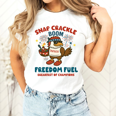 SNAP CRACKLE BOOM | FREEDOM FUEL BREAKFAST OF CHAMPIONS | AMERICAN SPIRIT IN EVERY BITE Soft Cozy Longer Length Unisex Graphic Tee T-shirt