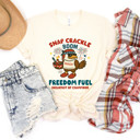  SNAP CRACKLE BOOM | FREEDOM FUEL BREAKFAST OF CHAMPIONS | AMERICAN SPIRIT IN EVERY BITE Soft Cozy Longer Length Unisex Graphic Tee T-shirt