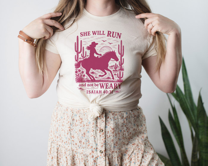 SHE WILL RUN and not be WEARY ISAIAH 40:31 | Unstoppable Spirit on the Horizon Soft Cozy Longer Length Unisex Graphic Tee T-shirt