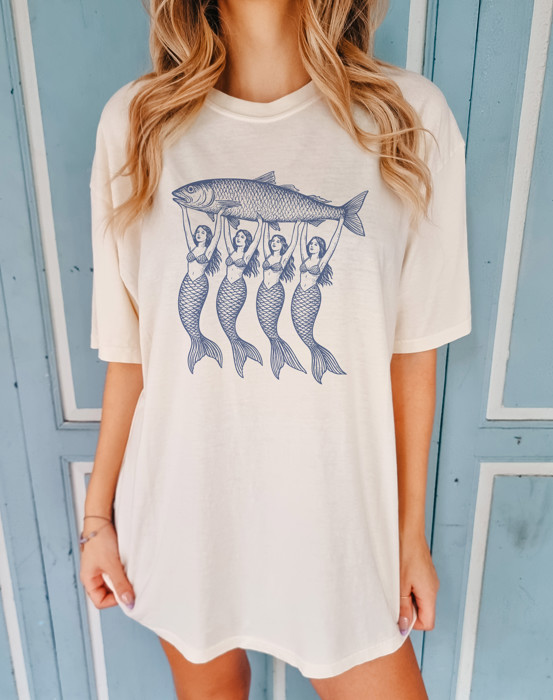 Mermaids Holding a Large Fish | A Catch of Mystical Proportions Unisex Heavyweight Comfort Tee