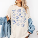  Shells and Starfish with Ribbons | Coastal Elegance: A Nautical Delight Unisex Heavyweight Comfort Tee