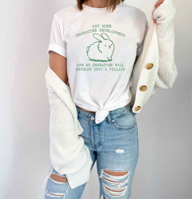 ANY MORE CHARACTER DEVELOPMENT AND MY CHARACTER WILL DEVELOP INTO A VILLAIN | When Cuteness Turns Dark: The Villainous Bunny Saga Soft Cozy Longer Length Unisex Graphic Tee T-shirt