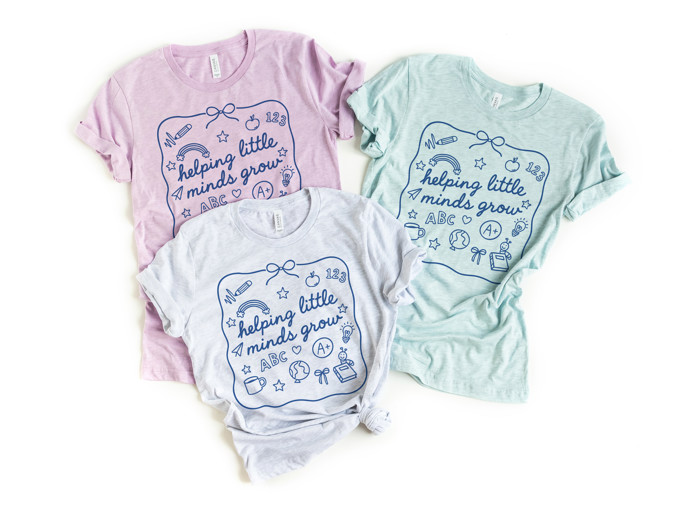 Teaching - Helping little minds grow | Nurturing Curiosity and Creativity Soft Cozy Longer Length Unisex Graphic Tee T-shirt