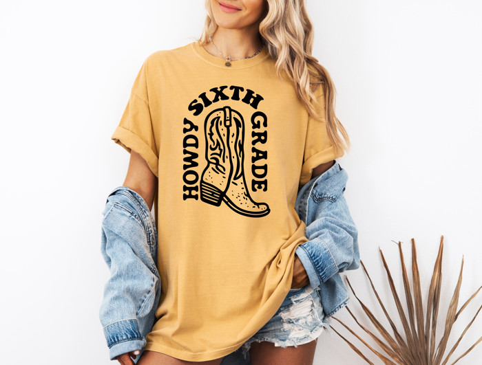 HOWDY SIXTH GRADE | Stepping into Sixth Grade with Spirit! Unisex Heavyweight Comfort Tee