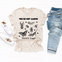  YOU'RE NOT ALONE! | Embrace the Buzz: A Celebration of Our Tiny Companions Soft Cozy Longer Length Unisex Graphic Tee T-shirt