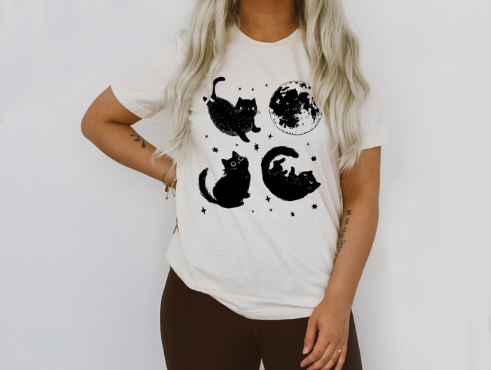 Spooky Cute Black Cats in Space | Cosmic Catventures Soft Cozy Longer Length Unisex Graphic Tee T-shirt