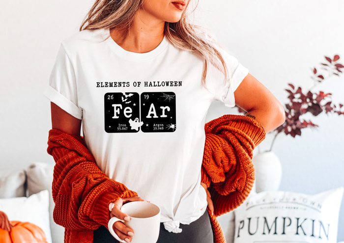ELEMENTS OF HALLOWEEN | The Spooky Periodic Table of Fear Soft Cozy Longer Length Unisex Graphic Tee T-shirt