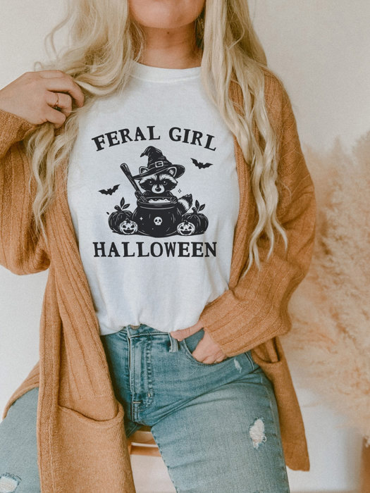 FERAL GIRL HALLOWEEN | Enchanted Mischief: A Spooky Tale of a Trickster's Brew Soft Cozy Longer Length Unisex Graphic Tee T-shirt