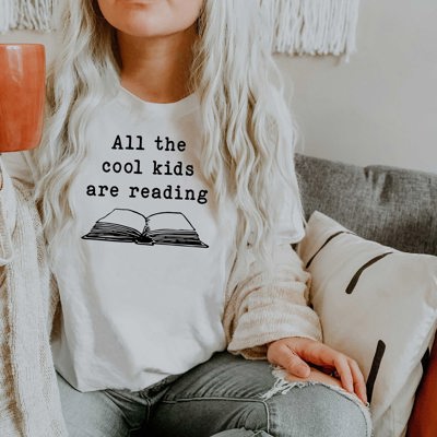 All The Cool Kids Are Reading Teaching Teacher Soft Cozy Longer Length Unisex Graphic Tee T-shirt