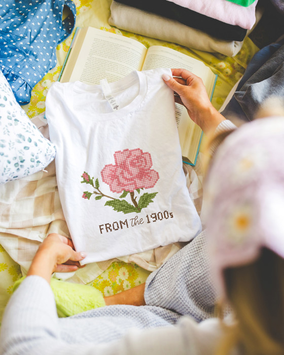 From The 1900s Faux Cross Stitched Pattern of a Vintage Rose - Soft Longer Length Bella Canvas