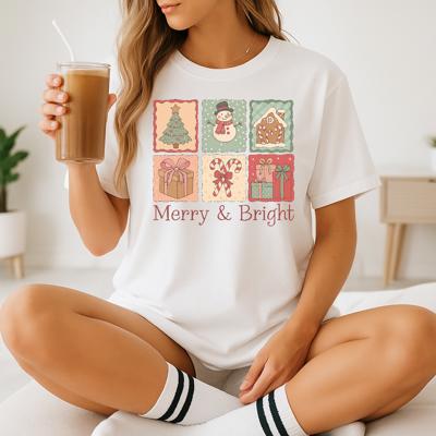 Floral Preppy Christmas Bow Tree Stamps Graphic Tee – Merry & Bright Holiday Shirt, Vintage Pastel Christmas Top, Cute Gift for Women