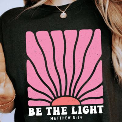 Be the Light Christian Graphic Tee – Matthew 5:14 Bible Verse Inspirational Black T-Shirt