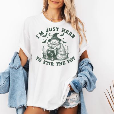 I'm Just Here to Stir the Pot Cat T-Shirt – Funny Halloween Witch Cat Graphic Tee with Cauldron