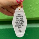  I’m a Boomer But Not the Fox News Kind Motel Style Keychain in White