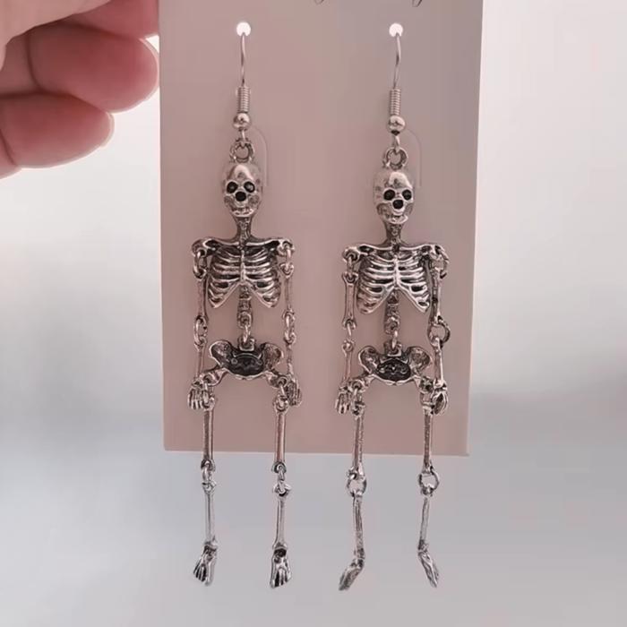 Anatomically Spooky Skeleton Dangle Earrings in Silver | Halloween Themed Fashion Jewelry